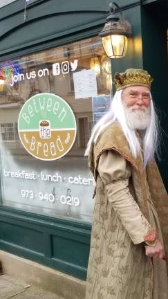 Dumbledore gets a sandwich at Between the Bread on Small Business Saturday, Nov. 24, 2018. Further photos on Business pages 22 and 23. To view even more great photos of Wizard Con and local businesses on a magical day, or to purchase photos, visit My Capture. (Photo by Shannon Kuratli).