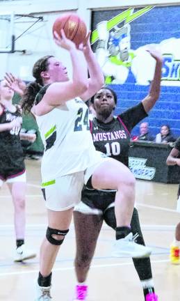 <b>Sussex Skylander's Marrisa Bouma (24) leaps during a shot. Bouma scored 8 points.</b>