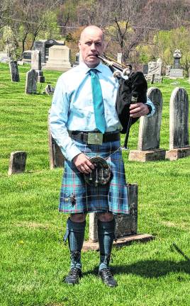 <b>Jeff Korger played Amazing Grace on the bagpipes.</b>
