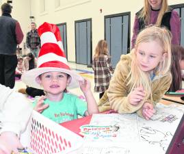 Benny and Allie Loverdi work on a craft.