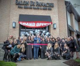 Salon di Panache in Sparta holds its ribbon cutting, featuring Sparta Town Mayor Dave Smith in the middle, with Patricia Heal and Kathy Czerhoniak to his right, and Kim Eben to his left.
