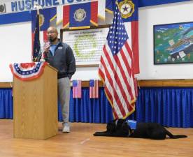 Retired U.S. Army Sgt. Sean Brown speaks about his experiences as a service dog recipient April 29 at Musconetcong American Legion Post 278 in Stanhope. At right is his service dog, Nick. (Photos by Mandy Coriston)