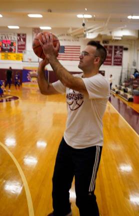 HW4 Superintendent Joe Piccirillo prepares to shoot a basket.