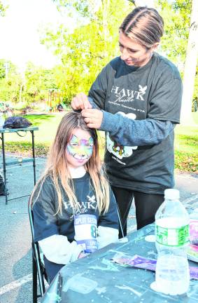 Callie Caldwell of Port Jervis, N.Y., gets her face painted.