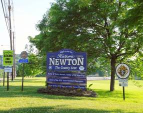 Where in Newton? Newton welcome sign, Mill St.