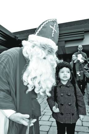 Saint Nicholas and Caroline Weiss, 2, of Sparta.