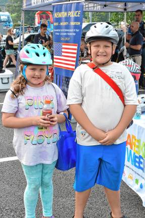 Rosalina Desibio and Brentley Foutch, both of Newton, show off their bike helmets.