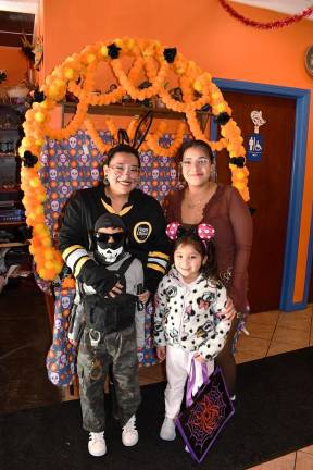 Paola and Dani Gonzalez are shown with Lia Salazar and Anelly Gonzalez.