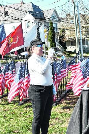 Anne Erickson of Bugles Across America plays.