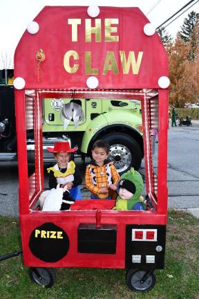 Alentina and Antonino Pisciotto are shown with Derek Kuperus, all of Wantage.