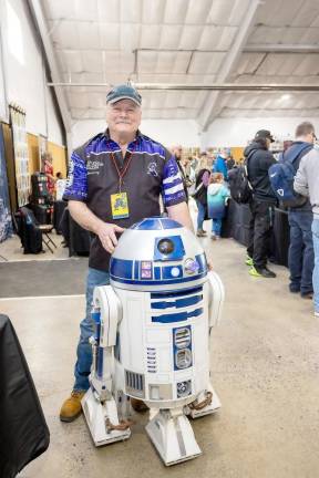 James Marsilia created this R2-D2 replica, which was signed by actors Harrison Ford and Carrie Fisher.