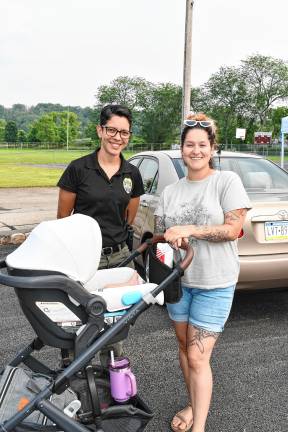 Newton police Detective Sgt. Judy Torres poses with Barbara Hunton of Newton.