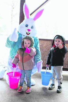 Emma and Enie Wunder of Hampton pose with the Easter Bunny.