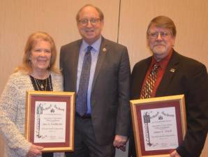 Jane Brodehecker and James Etsch (left) were recently honored for distinguished service.