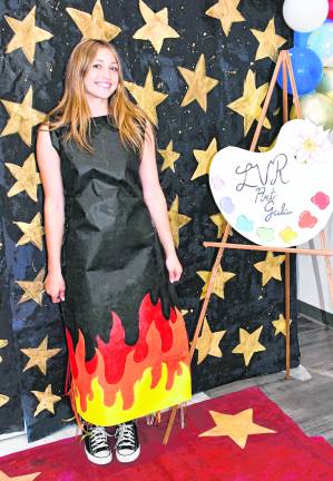 Mariana Akerman poses in a dress she designed.