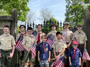 Members of Boy Scouts Troop 85 of Andover-Newton replaced about 900 flags on the graves of veterans at Newton Cemetery, St. Joseph’s Cemetery, Old Newton Burial Ground and Andover Cemetery last month. In tront row, from left, are Brett Anderson, Anthony and Vincent Quaglio, Chase Vince-Cruz and Ryan McCauley. In back row, from left, are Michael and Anthony Del Guercio, Patrick McCauley, Matteo Pascale and EJ Muldoon. Not pictured are Tucker Carlson and Quinn McCully. (Photo provided)