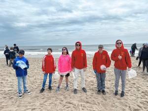 Members of Boy Scouts Troop 85 and Cub Scouts Pack 181 in Andover-Newton take part in first Earth Day beach cleanup in Point Pleasant on April 20. They were joined by Boy Scouts, Girl Scouts and Cub Scouts from throughout New Jersey. (Photo provided)