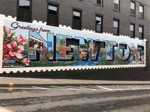 The Newton mural has been placed on a building at Moran and Spring streets. (Photos by Kathy Shwiff)