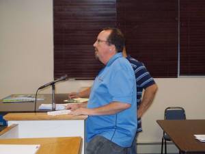 Photo Vera Olinski Water Operator Mike Furrey reports to council about the plant shutdown on July 4.