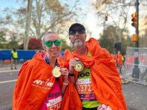 Byram Township Manager Joseph Sabatini and his daughter Angelica finish the New York City Marathon on Nov. 5. They had been training since March to run the 26-mile course through the five boroughs. They ran in memory of his father, who died soon after they learned that Joe had been selected through the marathon lottery. Angel qualified by raising nearly $3,400 for Think Pink Rocks, which supports breast cancer research and awareness. (Photo provided)