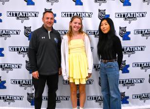 Kittatinny Regional High School student Lillian Gallant is shown with Principal Brian Bosworth and history teacher Ms. Im.