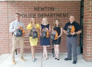 The Newton Police Department received sensory bags for their patrol cars.