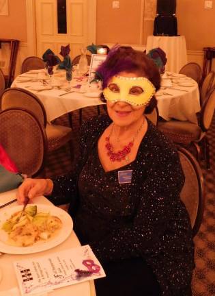 Marion Cuff of The Grace Financial Group enjoys dinner at the Sussex County Arts &amp; Heritage Council's Masquerade Gala on Friday, Oct 11, 2019, at the Lafayette House. Cuff has been a sponsor and supporter of SCAHC for 25 years.