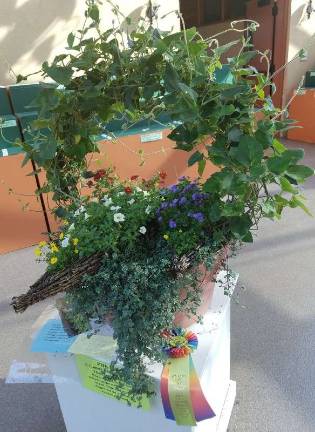 The Best in Show for Professional Floral Arrangers went to Richard Kawaske of Fair Acres, for his interpretation of the theme &quot;Dutch Canal Boat&quot;.