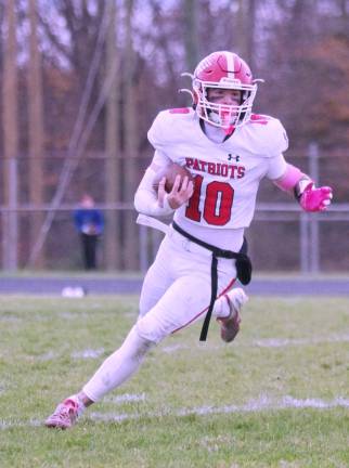 Lenape Valley quarterback Chase De Oliveira runs with the ball. De Oliveira threw a touchdown pass.