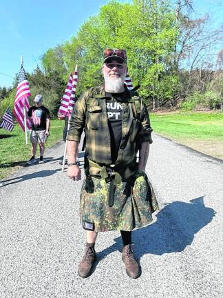 Todd Francisco, who served in the Army, dressed for the event.