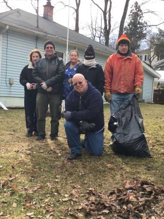 Sussex County resident Lorie Wojtecki (center) and volunteers from Christ Church Newton’s Helping Hands program for eligible senior citizens.