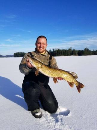 Ice anglers enjoy frigid temperatures and tranquility