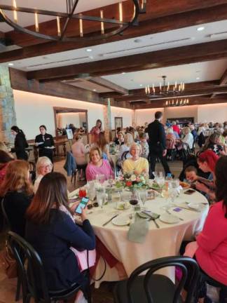 About 155 people attended the April Showers fundraising luncheon April 22 at Perona Farms.