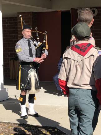 Jeffrey Korger of the Franklin Borough Police Department plays the bagpipes.