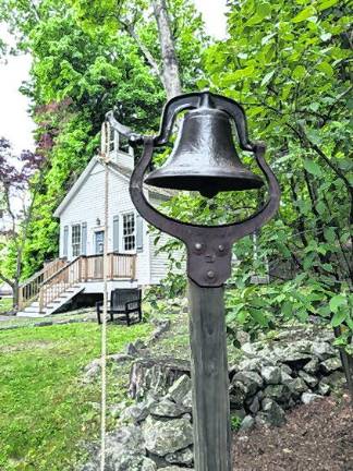 The restored school bell.
