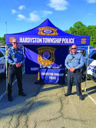 TN5 Sgt. Alan Carbery and Patrolman Eric Stickle of the Hardyston Police Department host a table at the event.