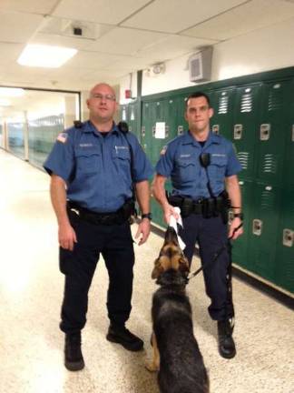 Hopatcong officers Schultz and Snyder with police dog Eli.