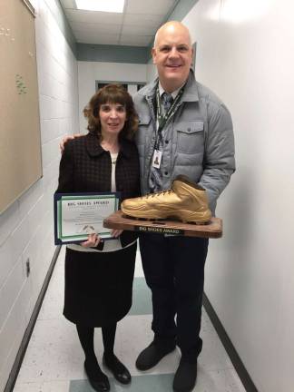 Deborah Gates receives the &quot;Big Shoes Award.&quot; (Photo provided).