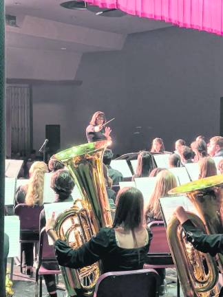 <b>Dr. Deb Gianuzzi conducts the High School Band </b>