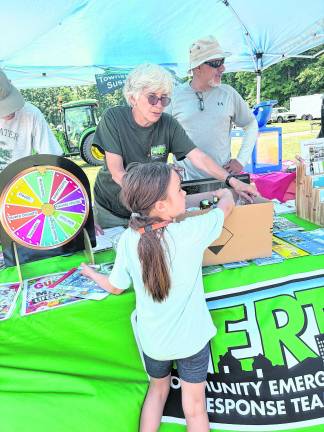 A child interacts with CERT members