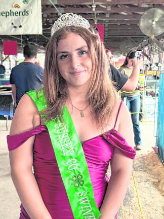 <b>Brianna Strada, Hampton. 4-H swine queen. As the queen, she said she loves talking to fair-goers and her community. Of course, she loves pigs. The 4-H has 15 clubs, each with a queen representative. </b>