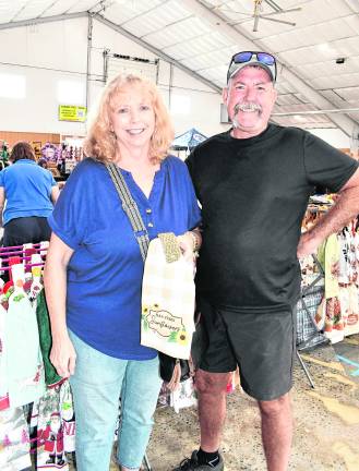 <b>Michelle and Chris Kalaskey of Lafayette pose for a photo.</b>