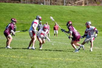 The Newton Braves and High Point Wildcats battle for control of the ball during a boys lacrosse game April 25 in Sussex. Newton won, 12-1 (Photos by George Leroy Hunter)