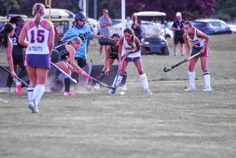 Lenape Valley and Wallkill Valley field hockey players battle for control of the ball in front of the goal during the season-opener Wednesday, Sept. 3 in Hamburg. The Patriots won, 2-0. (Photos by George Leroy Hunter)