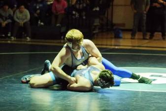 Kittatinny's Tucker Lockburner, top, grapples with Sparta's Connor White in the 285-pound weight class. Lockburner won by decision, 3-1, on Friday, Jan. 26. (Photos by George Leroy Hunter)