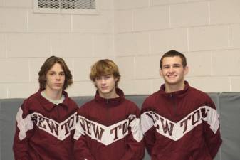 Newton High School juniors, from left, Keegan Murtagh, Mason Bucci and Aaron Stone are captains of the wrestling team. (Photo provided)