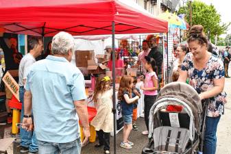 Residents visit vendors along Spring Street during Newton Day on Saturday, June 7. (Photos by Maria Kovic)