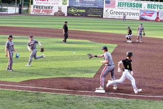 <b>The Sussex County Miners’ Hunter D'Amato reaches first base before the ball in the second inning of a game against the Brockton Rox on Saturday, Aug. 2. The Miners won, 9-3. (Photos by George Leroy Hunter)</b>