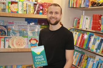 Lou Redmond, author of “Find Your Truth” shared his story Nov. 25 at Sparta Books. Photos by Rose Sgarlato