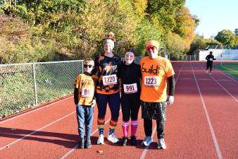 Eamon, Mora, Ava and Josh Karas of Newton are shown at the Newton High School Monster 5K